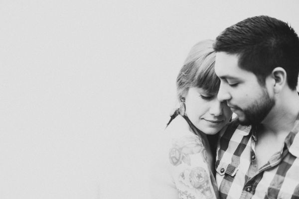 Couple embracing in black and white portrait