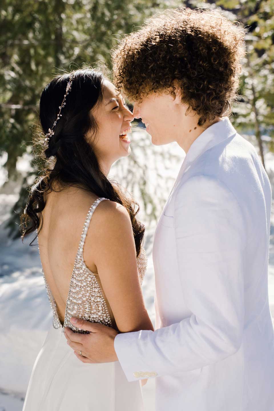 Couple smiling at outdoor wedding ceremony