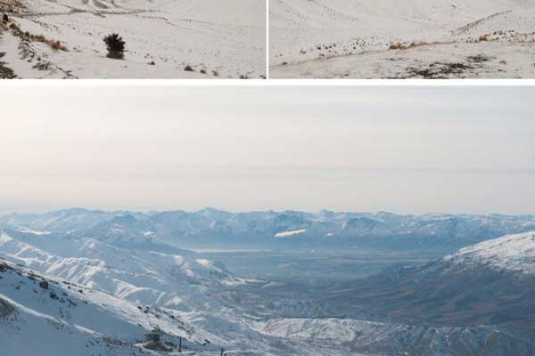 Snow-covered mountains under a clear sky