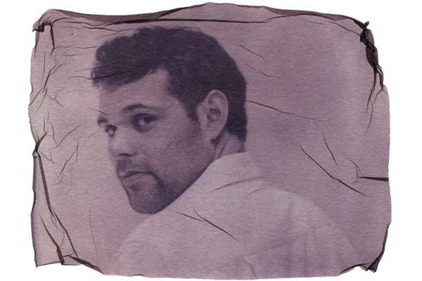 Man looking back over shoulder in vintage portrait